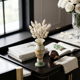 Multicolor onyx floral vase on black writing desk