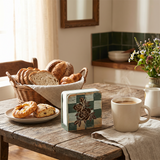 Napkin holder on rustic wood table
