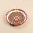 Ornate red patterned ceramic plate