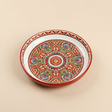 Ornate red patterned ceramic plate