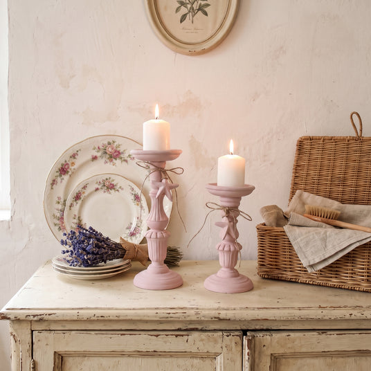 Pink Candle Holder Set On Vintage Cabinet