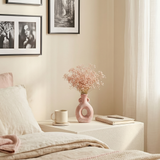 Pink hollow vase in minimalist bedroom