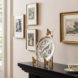 Plate display holder on black entry consoletable