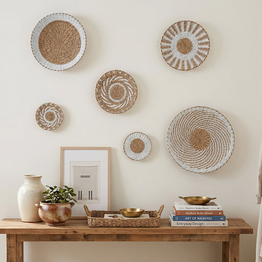 Plates decor behind console table
