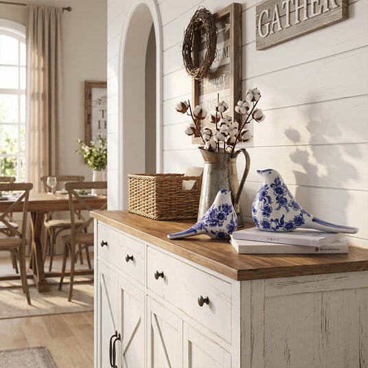 Porcelain bird set on white entry cabinet