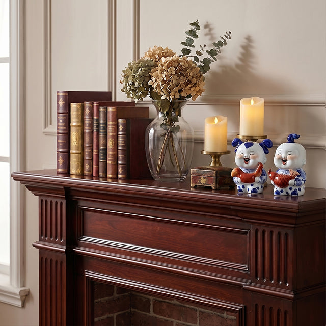 Porcelain child pair on classic fireplace mantel