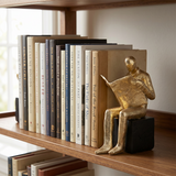 Golden Reader Sculpture – Polyresin Abstract Figurine, Antique Gold Finish & Black Base, Home Office Bookshelf Décor, Reading Nook Accent