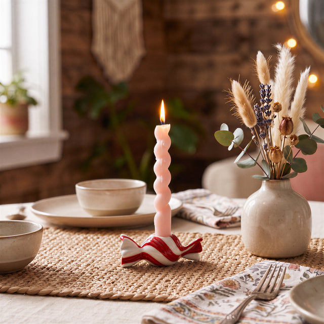 Red Candy Candle Holder On Woven Table Mat