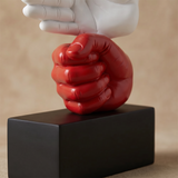 Red Hand Gesture Figurine
