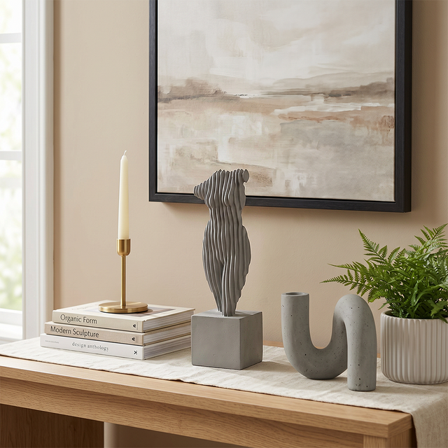 Ribbed statue on decorated wood console