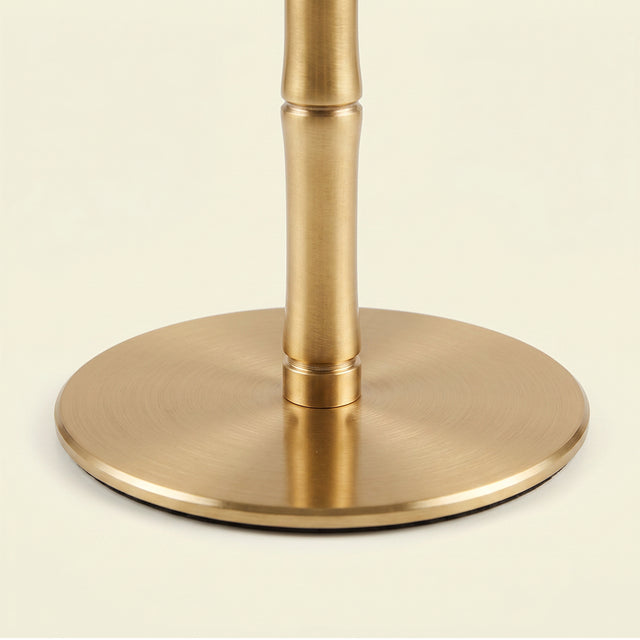 Round flat brass base closeup view