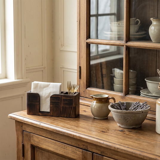 Rustic wood napkin holder on console table
