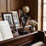 Sculpture placed on vintage wood piano