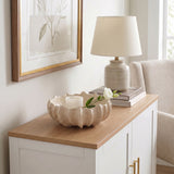 Shell Bowl With Candle On Cabinet