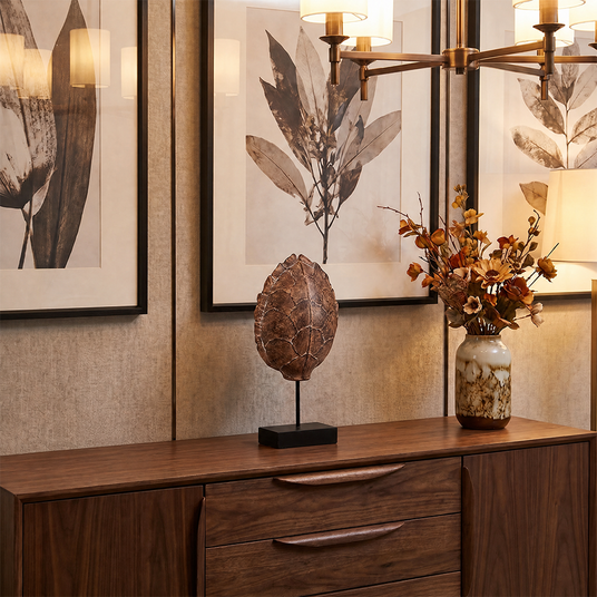 Shell decor on wood sideboard
