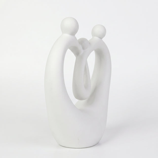 Side View Of White Family Sculpture