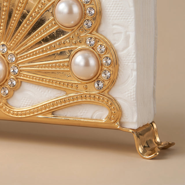 Side detail ornate metal napkin display