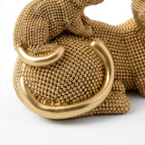 Side detail shot golden cat and curved tail