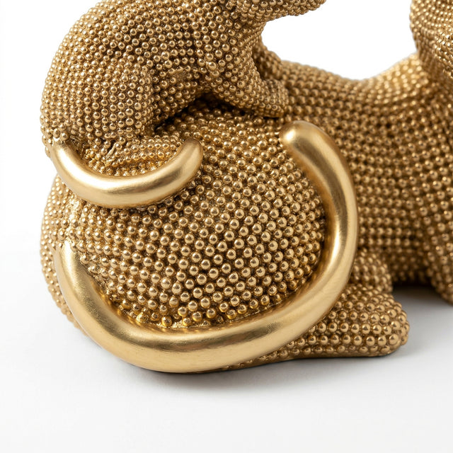 Side detail shot golden cat and curved tail