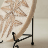 Side profile round stone plaque and wrought iron rack