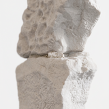 Side view cracked stone figure detail