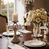 Silver figure candlestick on formal dinner table