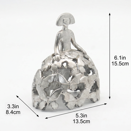 Size marked metallic female figurine