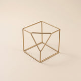 Small gold wire geometric ornament
