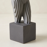 Square gray base sculpture bottom shot