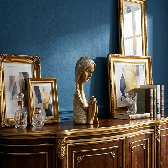 Statue on blue wall vanity table