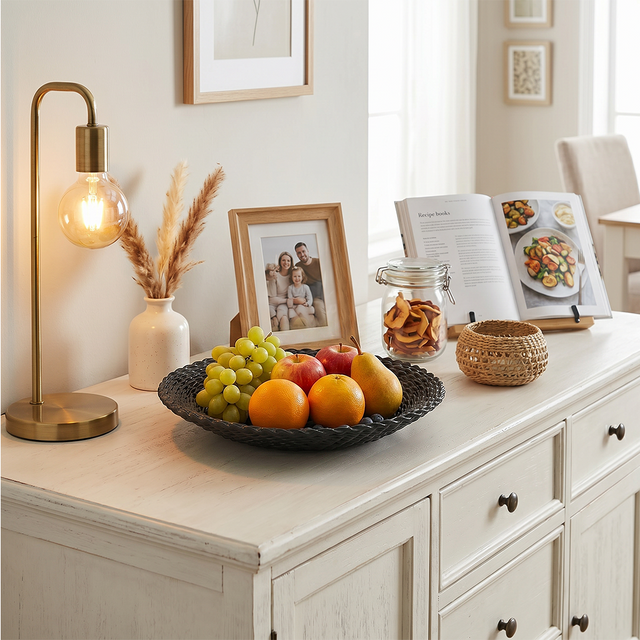 Stone texture bowl on cream wood sideboard