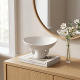 Textured Ceramic Bowl On Wooden Cabinet