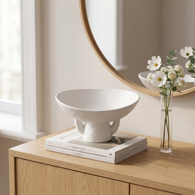 Textured Ceramic Bowl On Wooden Cabinet