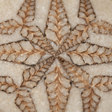 Topview eight pointed leaf carving stone surface