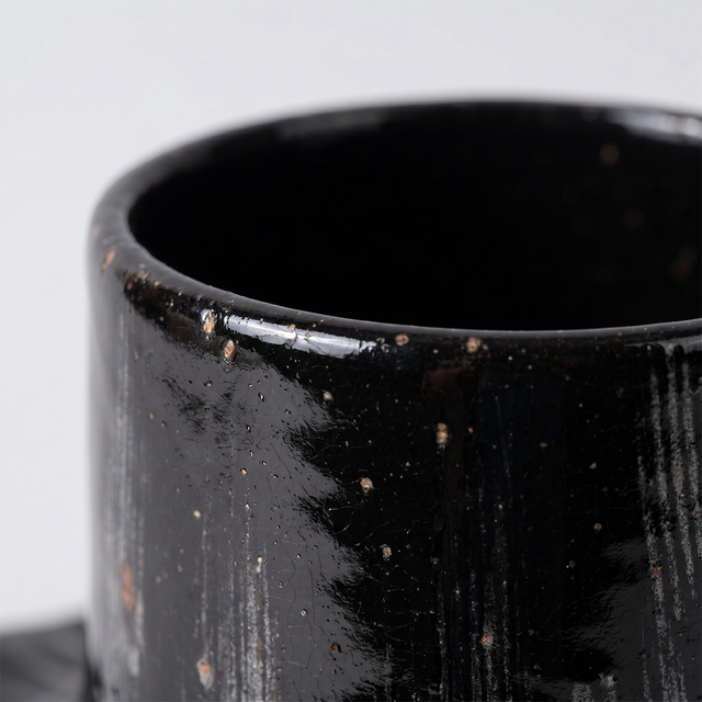 Top view glossy black vase opening