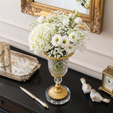Vase with white blooms on entry console