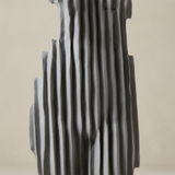 Vertical groove statue texture detail