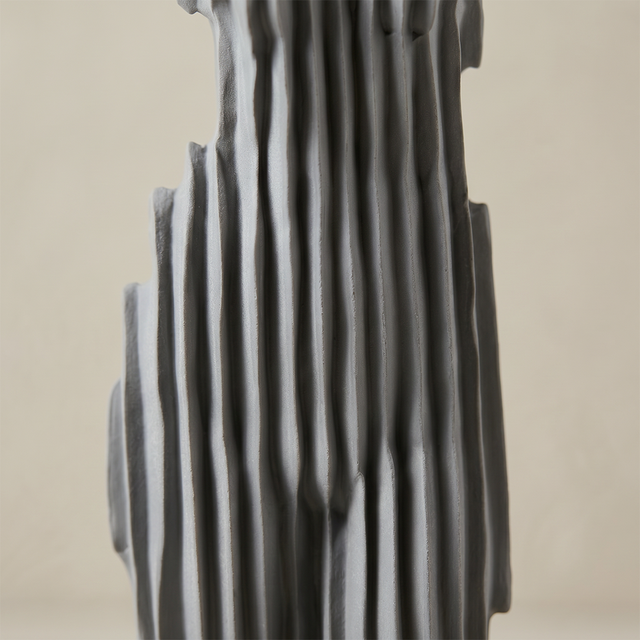 Vertical groove statue texture detail