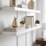 Wavy Pear Sculpture On White Shelf