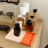 White Orange Color Block Leather Wrapped Organizer Tray on the Table