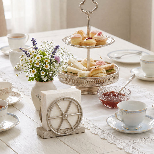 White Wagon Wheel Holder With Afternoon Tea