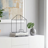 Wire house decor on white cabinet
