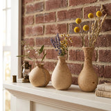 Wooden Vase Set On White Shelf