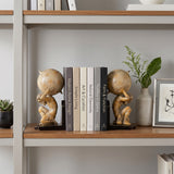 angel bookends on interior shelf