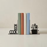 black cookbook and utensil metal bookends