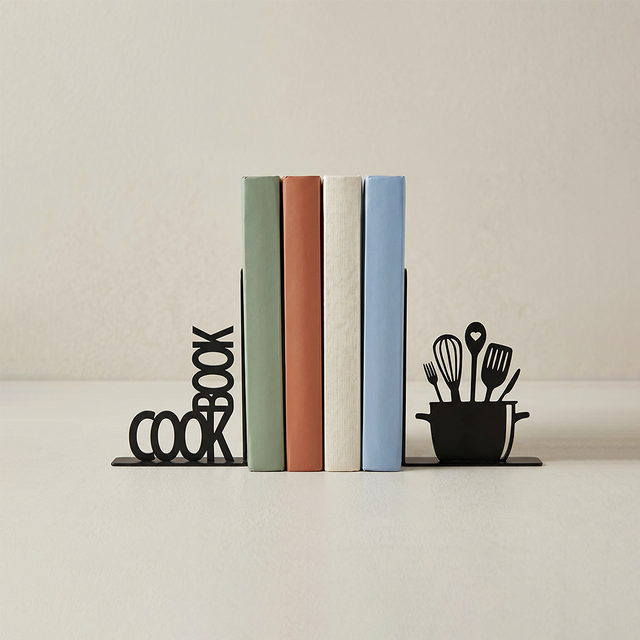 black cookbook and utensil metal bookends