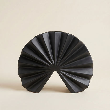 black fan pleated ceramic decor on beige