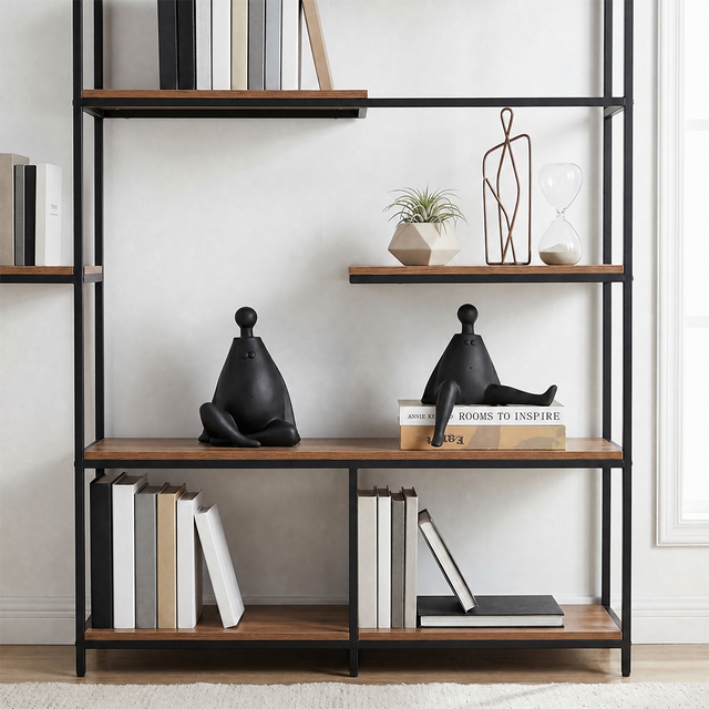 black figurines on black bookshelf