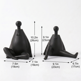 black sitting and stretching figurines size chart