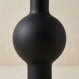 black vase body close up